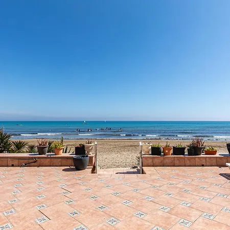 Beachfront Bliss: A Pie De Playa Hébergement de vacances